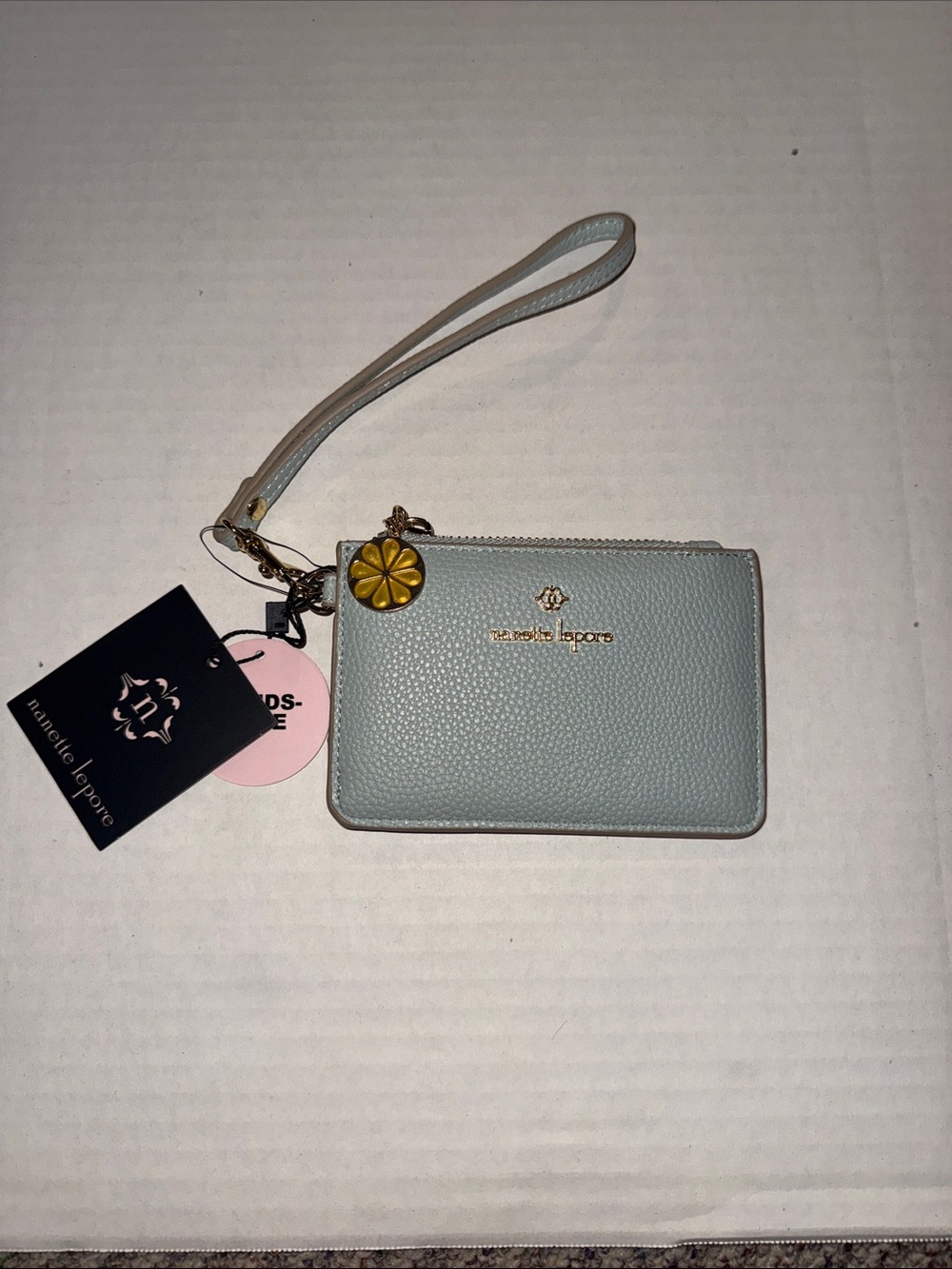 Nanette Lepore Pale Blue Pebbled Wristlet Card Case with Daisy Charm